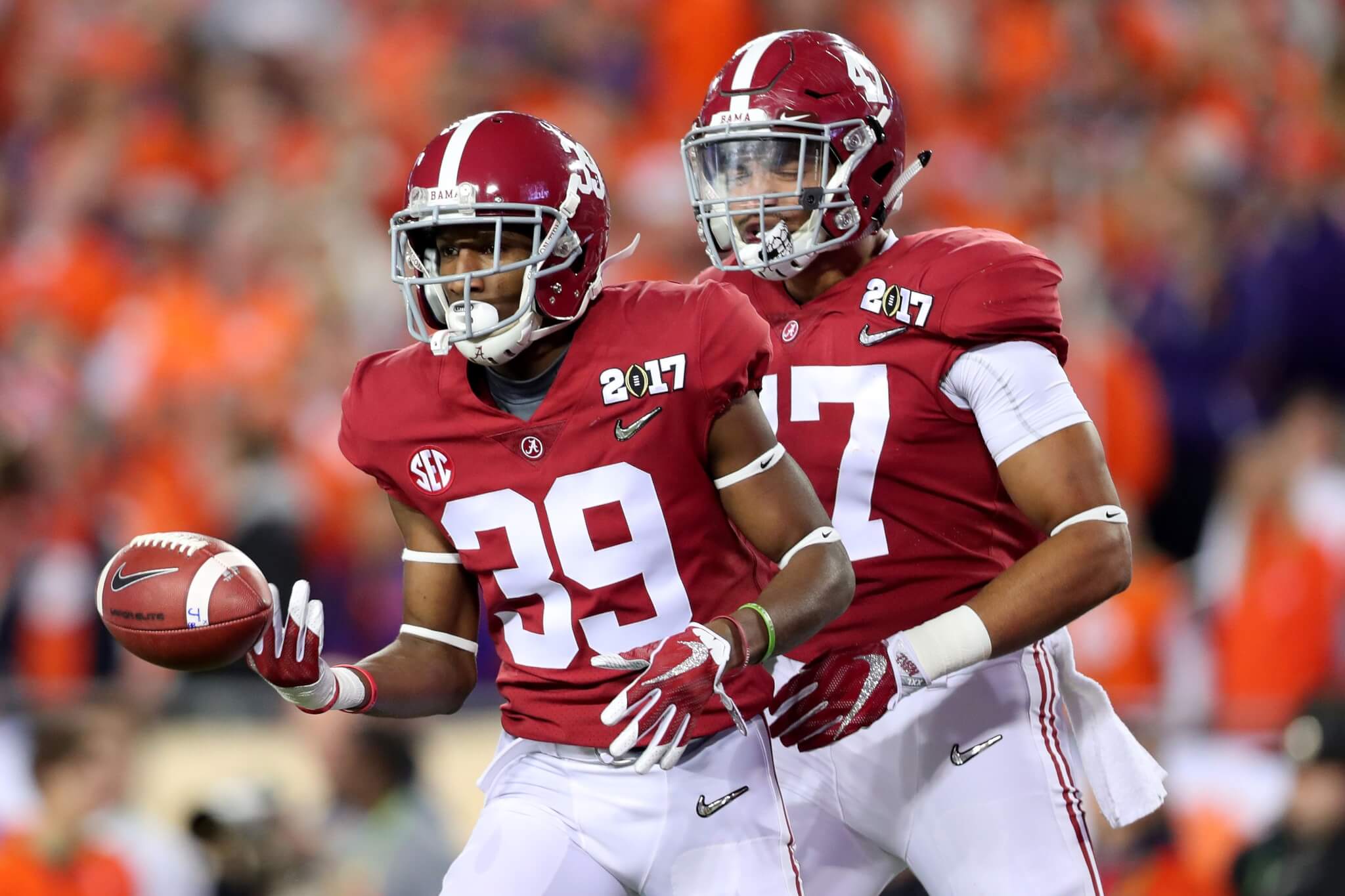 TAMPA, FL - JANUARY 09:  Defensive back Levi Wallace #39 and linebacker Christian Miller #47 of the Alabama Crimson Tide react during the first half against the Clemson Tigers in the 2017 College Football Playoff National Championship Game at Raymond James Stadium on January 9, 2017 in Tampa, Florida.  (Photo by Tom Pennington/Getty Images)