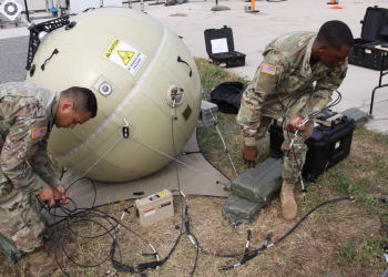 Staff Sgt. Pedro Garcia Bibian (left) and Spc. Christopher Bellanfant test the Transportable Tactical Command Communications-Lite system during Tactical Digital Media training at Aberdeen Proving
Ground, Maryland. Army photo by Dan Lafontaine, PEO C3T Public Affairs.