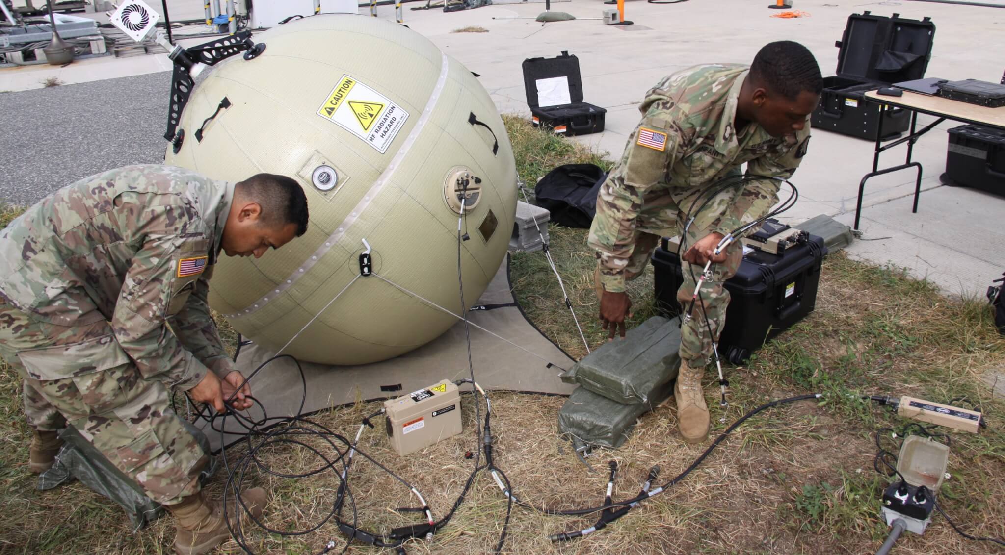 Staff Sgt. Pedro Garcia Bibian (left) and Spc. Christopher Bellanfant test the Transportable Tactical Command Communications-Lite system during Tactical Digital Media training at Aberdeen Proving
Ground, Maryland. Army photo by Dan Lafontaine, PEO C3T Public Affairs.