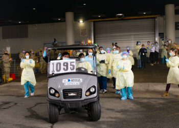 Jorge Rodriguez, the 1,095th and final COVID-19 patient was treated and released at the Javits Medical Station and receives a sendoff by the COVID-19 responders. Photo by 1st Lt. Lauren Warner.