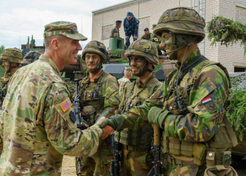U.S. Army Maj. Gen. John Gronski, deputy commanding general, United States Army Europe, greets Dutch soldiers with the NATO enhanced forward presence battle group during Saber Strike 18 training at Pabrade Training Area, Lithuania on June 11, 2018. Saber Strike is an annual exercise in its eighth iteration that tests participants from 19 countries on their ability to work together and improve each unit’s ability to perform their designated missions. (U.S. Army photo by Sgt. Gregory T. Summers / 22nd Mobile Public Affairs Detachment)