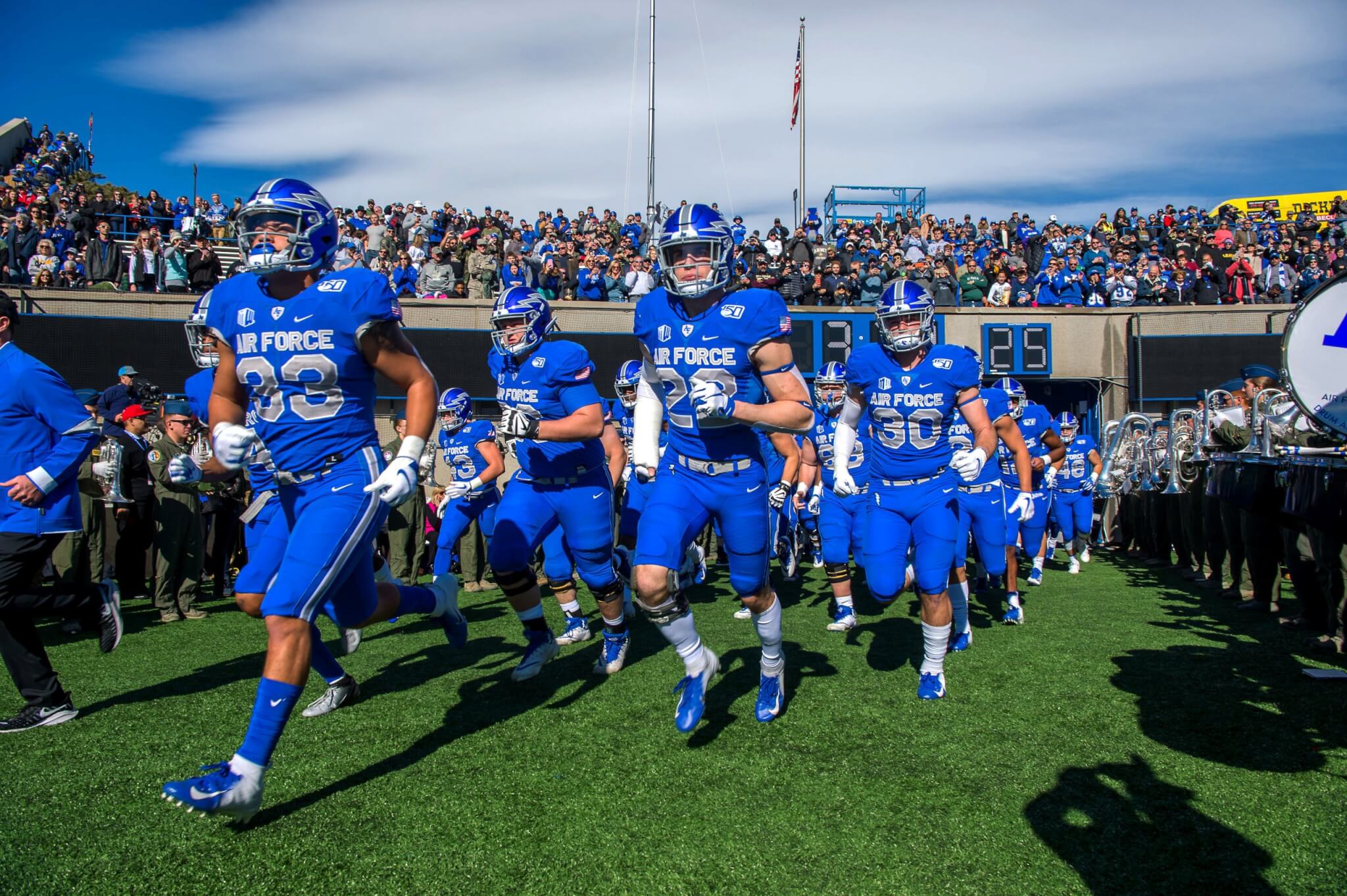 Air Force players take to the field prior to the opening kickoff in 2019 during a football game against Army at Falcon Stadium.  Photo/Trevor Cokley.