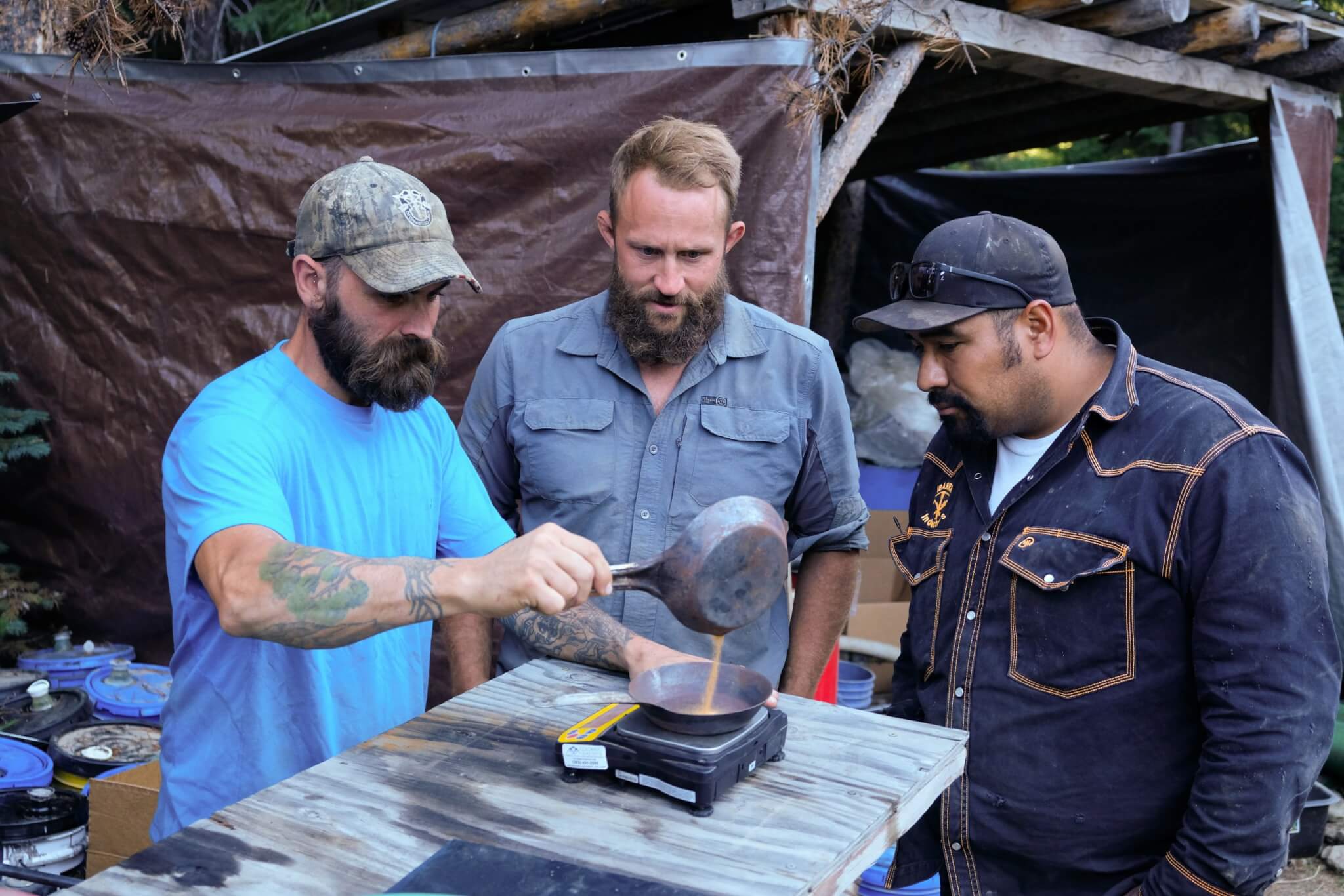 Fred Lewis, Kendell Madden and Juan Ibarra pouring gold. Source: Discovery Channel