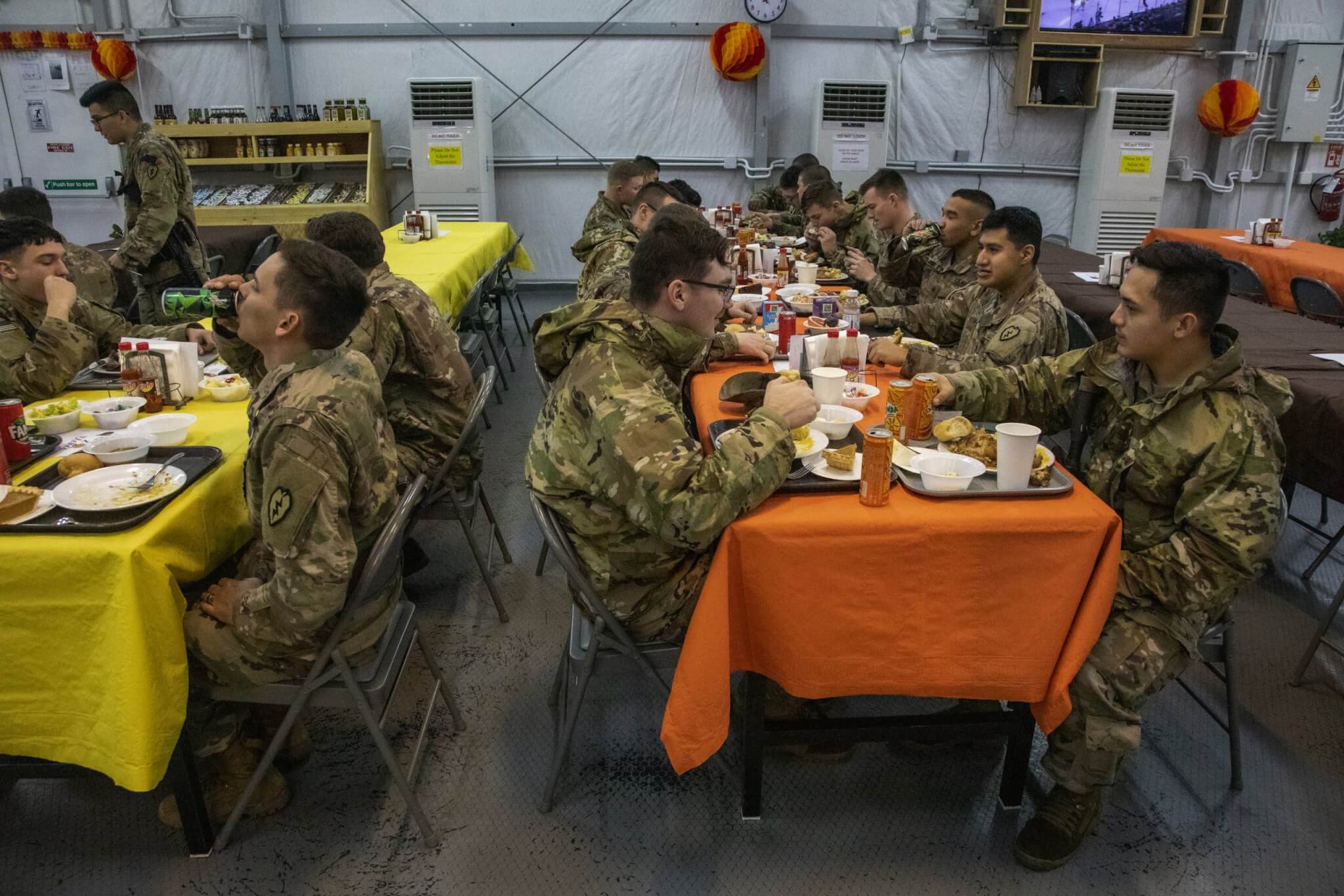 U.S. Army Soldiers celebrate Thanksgiving while deployed in support of Operation Inherent Resolve at Erbil Air Base, Iraq, Nov. 28, 2019. The Soldiers chose from a selection of Thanksgiving classics including turkey, mashed potatoes, and green bean casserole. (U.S. Army photo by Spc. Angel Ruszkiewicz)