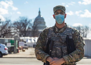 Sgt. Paulo Henriques, a calvary scout with the New Jersey Army National Guard’s Troop B, 1st Squadron 102nd Cavalry Regiment, provides sector security near the U.S. Capitol in Washington, D.C. The National Guard has been requested to continue supporting federal law enforcement agencies with security through mid-March. Photo by Sgt. Mathew Rosado