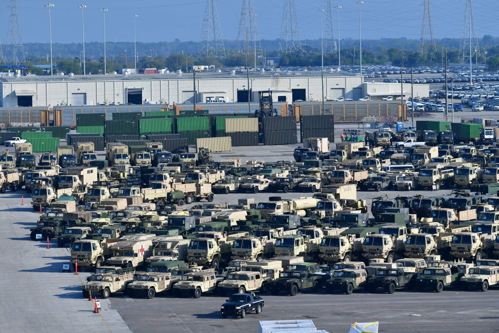Florida National Guard’s 53d infantry Brigade Combat Team equipment and vehicles are pre-positioned to be loaded on a ship at the Port of Jacksonville. The Military Surface Deployment and Distribution Command is moving around 750 vehicles from this port in support of DEFENDER-Europe 21. Photo by Kimberly Spinner