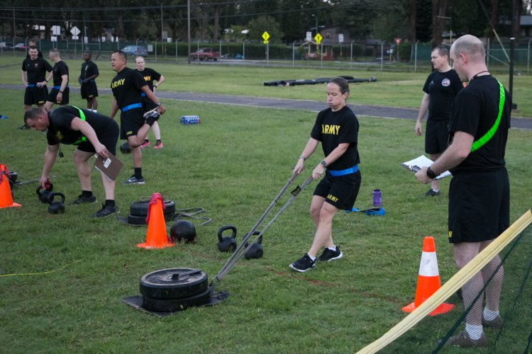 Lt. Col. Jen McDonough, 25th Infantry Division G-4, completes the drag portion of the sprint-drag-carry event during a diagnostic Army Combat Fitness Test. U.S. Army photo by Staff Sgt. Alan Brutus.