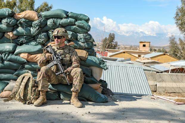 Capt. Madison Bipps, the Protections Officer assigned to Headquarters and Headquarters Company of the 48th Infantry Brigade Combat Team, observes the surrounding area from a position of cover in Laghman Province, Afghanistan Feb. 7, 2019. The 48th Infantry Brigade Combat Team is deployed to Afghanistan in support of Operation Freedom’s Sentinel. The 48th Infantry Brigade Combat Team is a modular infantry brigade of the Georgia Army National Guard. (Jordan Trent/U.S. National Guard)