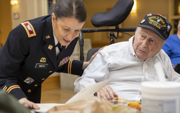 Then-Col. Isabel Smith, chief of staff of the 53rd Troop Command, visits the New York State Veterans Home in Montrose, New York, on June 6, 2019, as part of an effort organized by Governor Andrew M. Cuomo to salute World War II veterans on the 75th anniversary of D-Day.