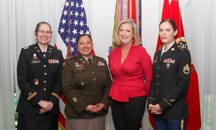 From left: Lt. Col Kelly Bell; Maj. Sam Winkler; Christine E. Wormuth, Secretary of the Army; and Staff Sgt. Nicole Pierce pose at the signing of the Parenthood, Pregnancy and Postpartum Army directive at the Pentagon on April 19, 2022. The directive, published on April 21, 2022, announces 12 pivotal changes to pregnancy and childbirth policy in the Army. (Photo by Staff Sgt. Tae Harrison)