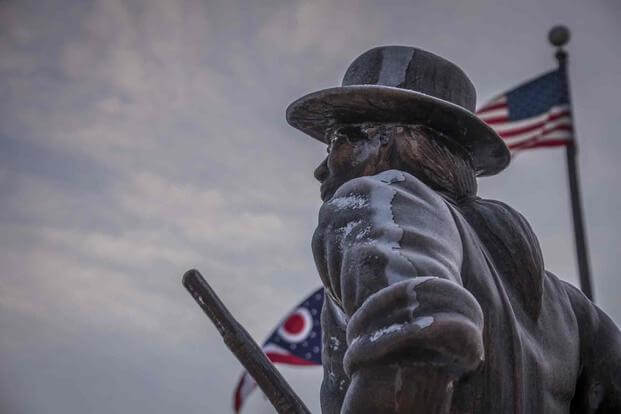 Ice covers the "Minuteman" statue in front of the Ohio Air National Guard Headquarters building, Dec. 20, 2016. (U.S. Air National Guard photo by Tech. Sgt. Joe Harwood\Released)