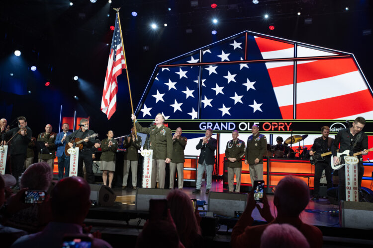 Staff Sgt. Craig Morgan took the oath of enlistment on the stage of the Grand Ole Opry. CREDIT: © Grand Ole Opry, photos by Chris Hollo
