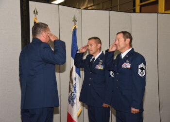 Twin brothers at the 185th Air Refueling Wing, Chief Master Sgt. Lucas Terry, the unit’s Vehicle Management Superintendent and Chief Master Sgt. Zachary Terry, the unit’s Distribution Superintendent both promote from senior master sergeant to chief master sergeant at their promotion ceremonies on August 6, 2023 in Sioux City, Iowa. Both Lucas Terry and Zachary Terry enlisted at the same time 23 years ago (U.S. Air National Guard photo by Airman 1st Class Olivia Monk).