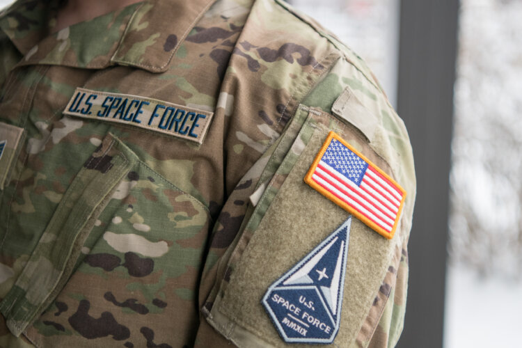 Staff Sgt. David Diehl II, 436th Communications Squadron NCOIC of wing cybersecurity, displays his new Space Force tapes and service branch patch at Dover Air Force Base in 2021. Diehl was one of three members of Team Dover accepted into the Space Force. Photo by Mauricio Campino