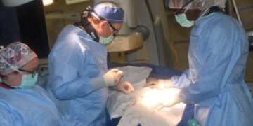 Surgery is performed in a hybrid operating room at WRNMMC. Photo by Alpha Kamara