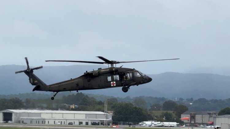 Tennessee National Guardsmen assigned to the 1-230th Assault Helicopter Battalion, in Knoxville, assembled three UH-60L Blackhawk helicopters and crew for aerial rescue operations in Unicoi County. (U.S. Air National Guard photo by Tech. Sgt. Teri Eicher)