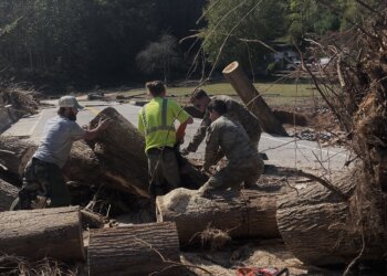 Army Reserve soldiers from the 357th Engineer Company out of Asheville, North Carolina, help the emergency response team clear road debris in support of citizens affected by Hurricane Helene in Burnsville, North Carolina (Yancey County).