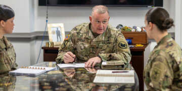 Lt. Gen. Robert Harter speaks with soldiers at the Pentagon. Photo by Trish Alegre-Smith