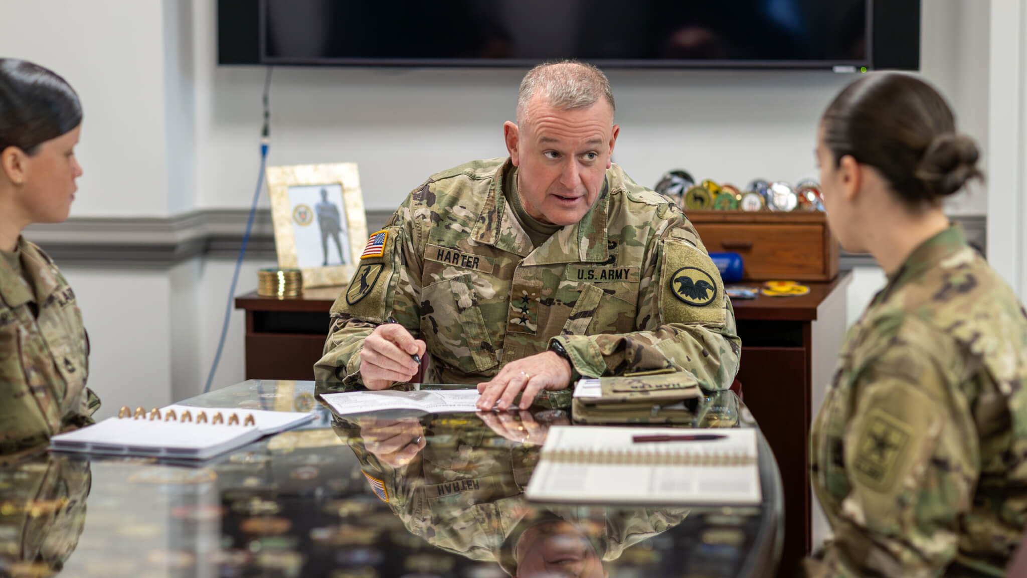 Lt. Gen. Robert Harter speaks with soldiers at the Pentagon. Photo by Trish Alegre-Smith