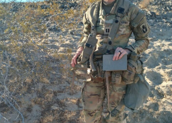 Florida Army National Guard Capt. Lauren Dickerson, an adjutant general officer with 53rd Brigade Support Battalion, 53rd Infantry Brigade Combat Team, was a certified mail carrier at the National Training Center in Fort Irwin, California. Photo by Staff Sgt. Justin Martin, 107th Mobile Public Affairs Detachment.