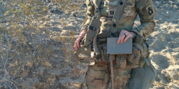 Florida Army National Guard Capt. Lauren Dickerson, an adjutant general officer with 53rd Brigade Support Battalion, 53rd Infantry Brigade Combat Team, was a certified mail carrier at the National Training Center in Fort Irwin, California. Photo by Staff Sgt. Justin Martin, 107th Mobile Public Affairs Detachment.