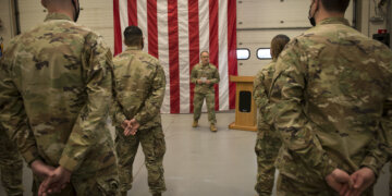 Members of the Connecticut Air National Guard, 103rd Air Control Squadron stand in formation during a briefing by Maj. Gen. Fran Evon, The Adjutant General of the Connecticut National Guard, 2021 in Orange, Connecticut. Photo by Master Sgt. Tamara R. Dabney