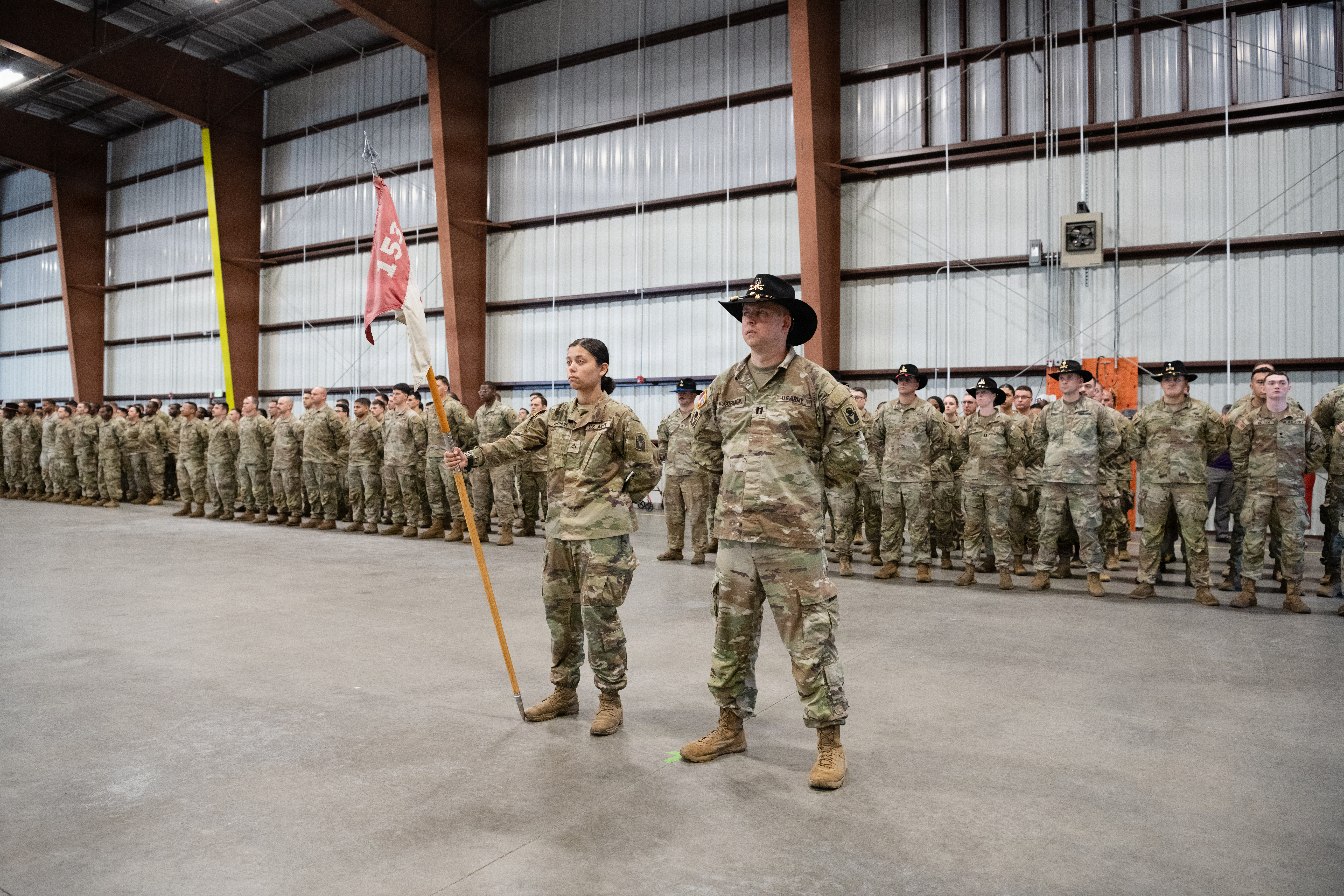 Florida Army National Guard Soldiers with 1st Squadron, 153rd Cavalry Regiment “Darkhorse” stand in formation during a departure ceremony in Panama City, Jan. 4, 2026. Major Gen. John D. Haas, The Adjutant General of Florida, and Maj. Gen. Robert G. Curruthers, Assistant Adjutant General-Army and the commander, Florida Army National Guard, was among those attending the event, signifying the unit’s deployment in support of global security objectives. Members of the Darkhorse specialize in reconnaissance and security operations. (U.S. Air Force photo by Staff Sgt. N.W. Huertas)