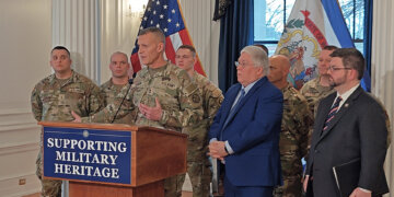 Governor Patrick Morrisey formally announced in December that the State of West Virginia has requested the posthumous award of the Purple Heart for U.S. Army Specialist Sarah Beckstrom and the same honor for Air Force Staff Sergeant Andrew Wolfe of the West Virginia National Guard for their service and sacrifice while protecting the nation’s capital in Washington, D.C. WVNG Adjutant General Maj. Gen. Jim Seward (at podium) joined Governor Morrisey to support the call for that highest honor for the Guardsmen. Courtesy photo.