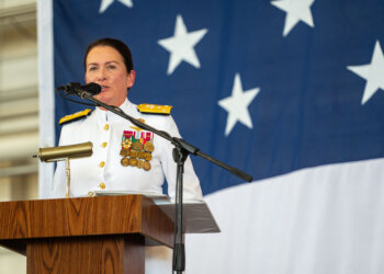 Vice Adm. Nancy Lacore, Chief of Navy Reserve delivers remarks during a change of command ceremony where Rear Adm. Luke Frost relieved Rear Adm. Mike Steffen as commanding officer of Commander, Navy Reserve Forces Command aboard Naval Station Norfolk on June 27, 2025. (U.S. Navy photo by Mass Communication Specialist 1st Class Tyra M. Watson)