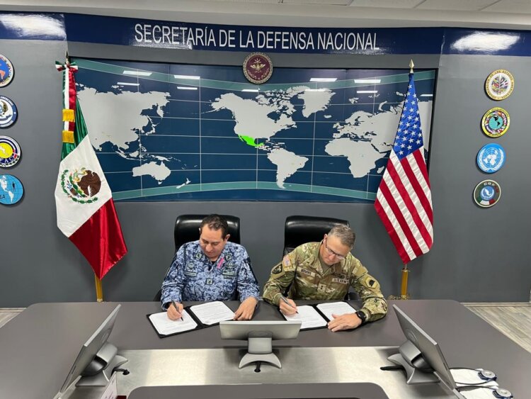 Army Maj. Gen. Matthew Beevers, adjutant general of the California National Guard, right, and Maj. Gen. Javier Sandoval Duenas, deputy chief of Military Doctrine of the National Defense Joint Headquarters Staff, sign a Letter of Intent formalizing an agreement for Mexico to join California as part the National Guard’s State Partnership Program on Oct. 28, 2025, in Mexico City. Photo by Capt. Jonathan Beck/DVIDS