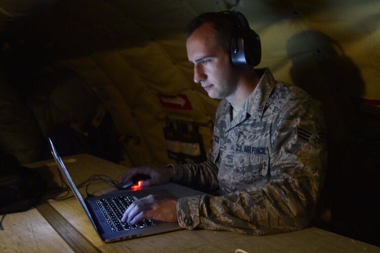 Senior Airman Ryan Zeski utilizes time during a long flight as a passenger on a Michigan Air National Guard KC-135 Stratotanker to work on some homework for a course he is taking at Oakland University in MIchigan, Nov. 8, 2018. Zeski is one of more than 250 Michigan Citizen-Airmen who are utilizing state or federal tuition assistance to further his education through his military service. (U.S. Air National Guard photo by Tech. Sgt. Dan Heaton)