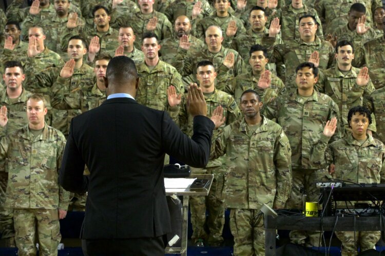District of Columbia National Guard members take part in a deputizing ceremony at the D.C. Armory, August 13, 2025. D.C. Guardsmen are activated to support a national initiative to beautify and keep the District of Columbia safe (U.S. Army National Guard photo by Spc. Sherald McAulay).