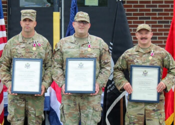 From left, Master Sgt. Andrew McDonnell, Master Sgt. Bryan Lord and Senior Master Sgt. Peter Dootz of the 265th Combat Communications Squadron. Photo by Lt. Col. Jeffrey Roosevelt.