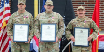 From left, Master Sgt. Andrew McDonnell, Master Sgt. Bryan Lord and Senior Master Sgt. Peter Dootz of the 265th Combat Communications Squadron. Photo by Lt. Col. Jeffrey Roosevelt.