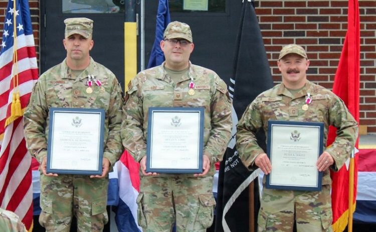 From left, Master Sgt. Andrew McDonnell, Master Sgt. Bryan Lord and Senior Master Sgt. Peter Dootz of the 265th Combat Communications Squadron. Photo by Lt. Col. Jeffrey Roosevelt.